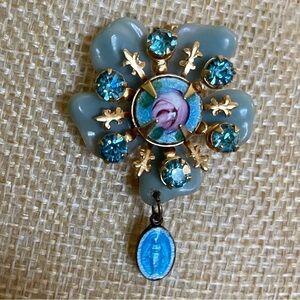 Elegant Gold and Blue Floral Brooch with Mother Mary icon